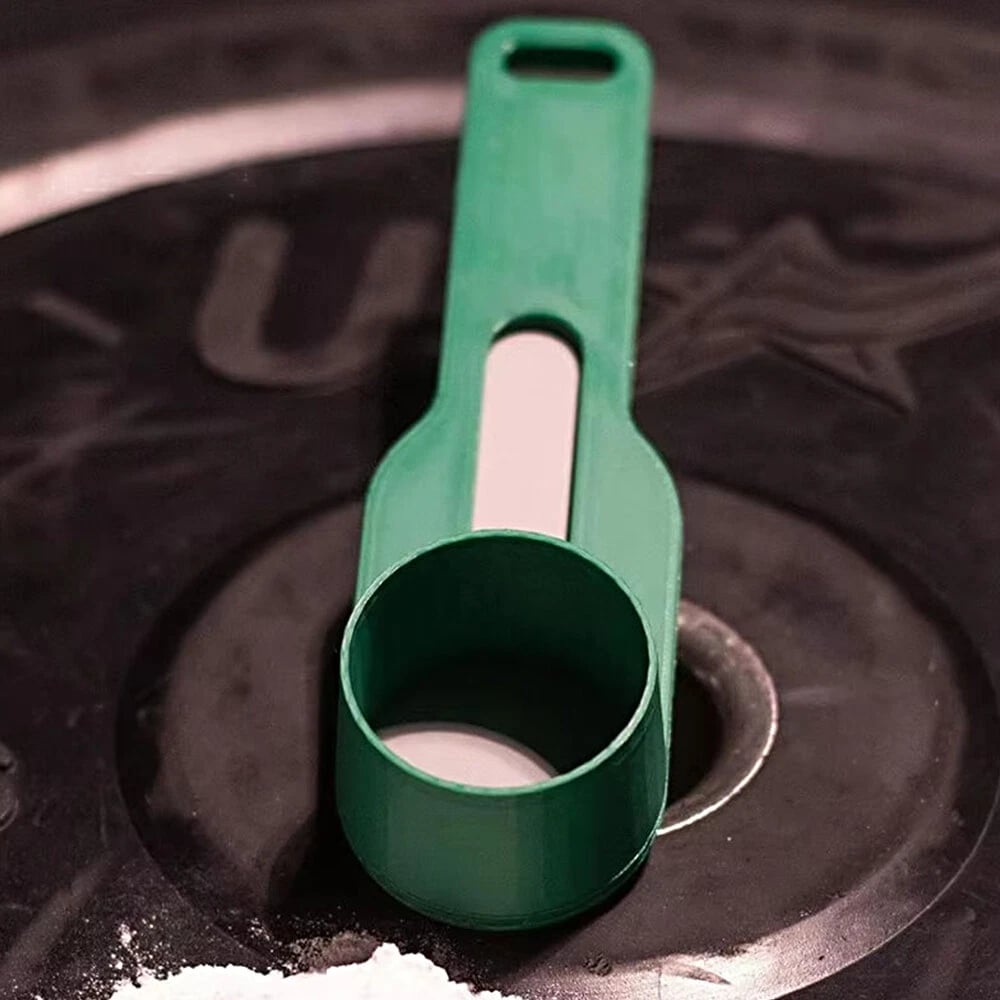 Practical and compact coffee scoop funnel with sliding measuring function